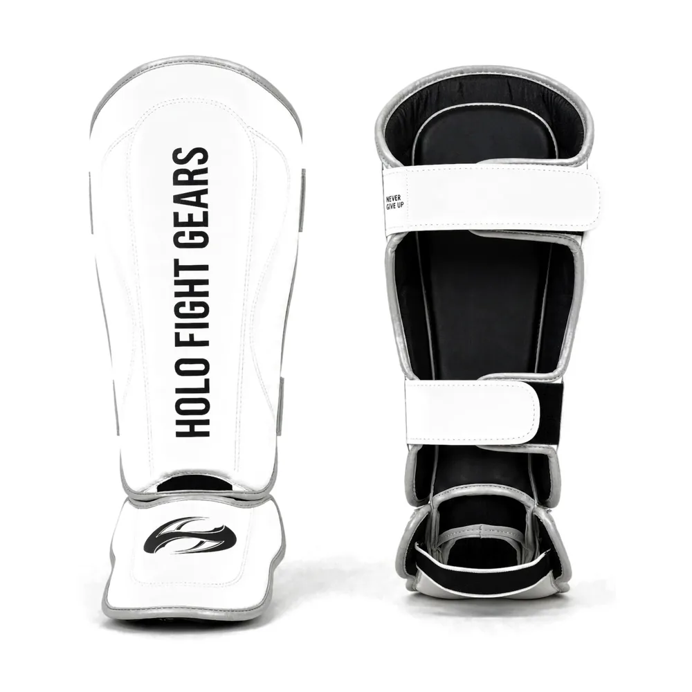 White Holo Fight Gears shin guards, front and back view