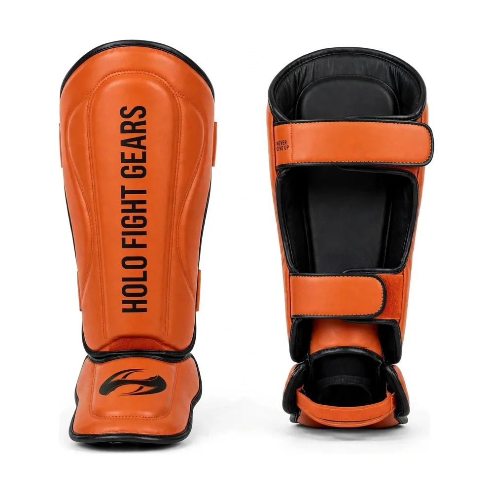 Orange Holo Fight Gears shin guards, front and back view