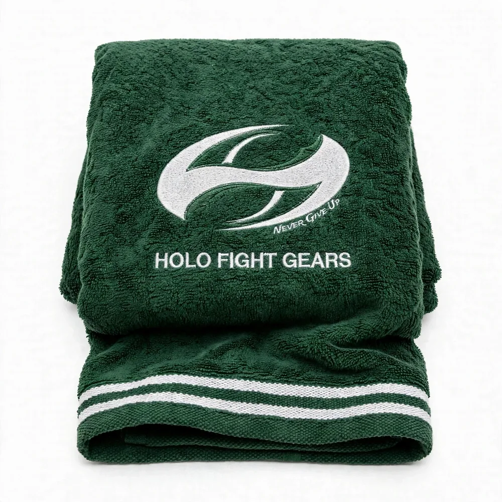 Green Holo Fight Gears premium cotton terry boxing towel, folded