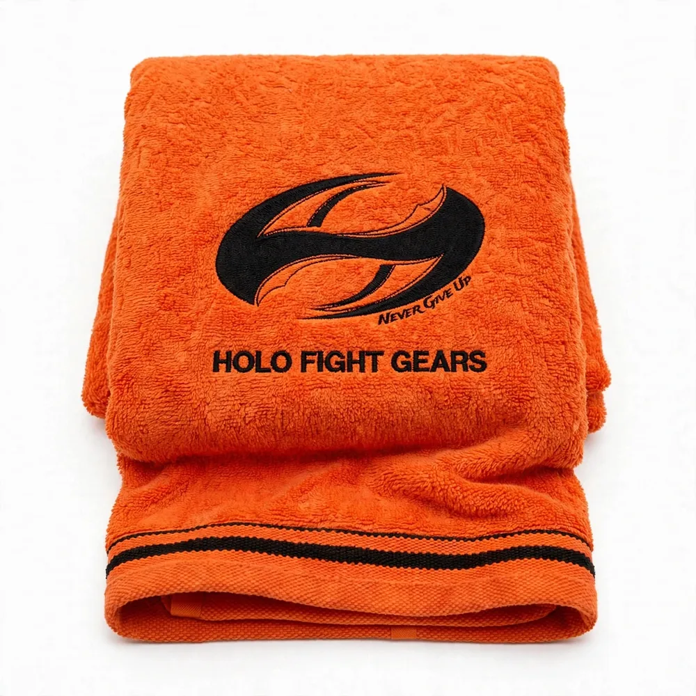 Orange Holo Fight Gears premium cotton terry boxing towel, folded