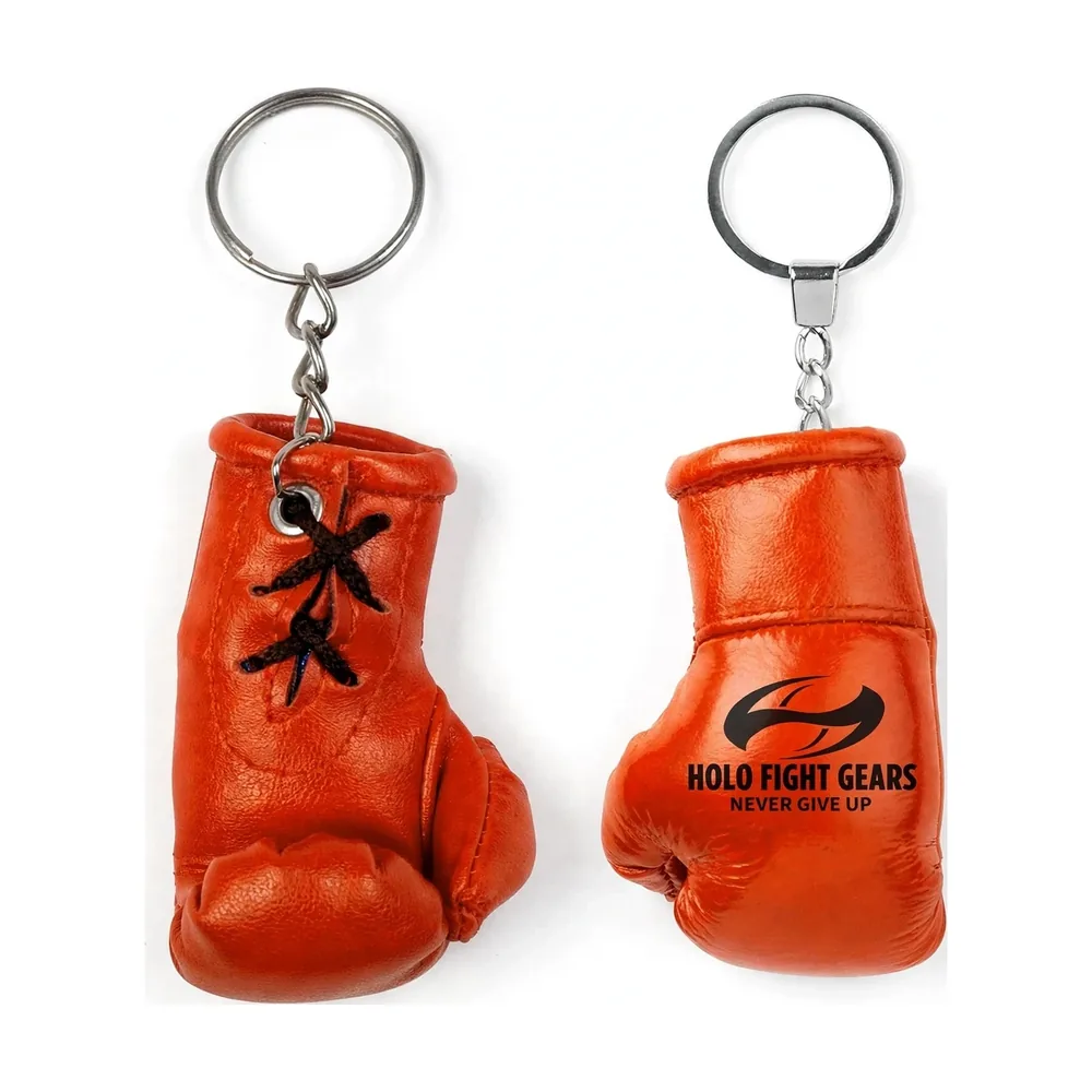 Orange Holo Fight Gears boxing glove keychain, lace-up palm side and smooth back panel on a split ring and chain